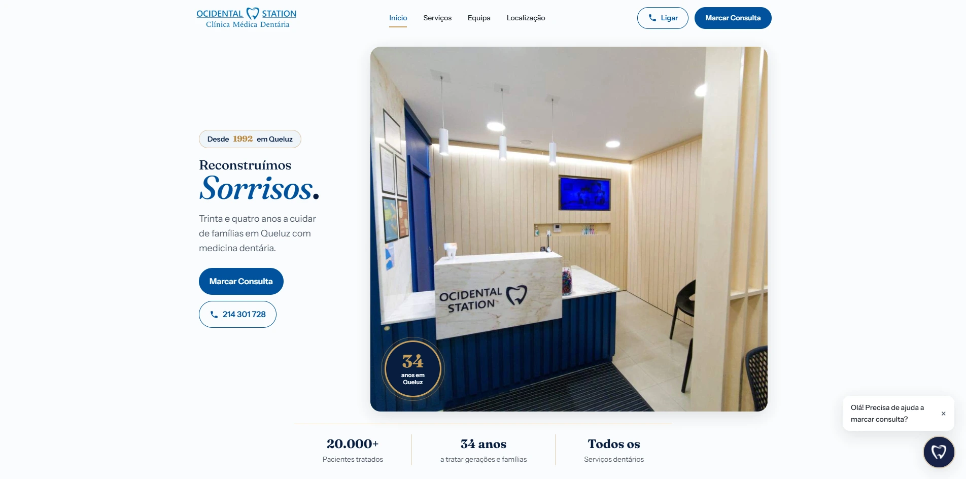 Página inicial do site da Ocidental Station, com o título "Reconstruímos sorrisos" e a receção da clínica em Queluz